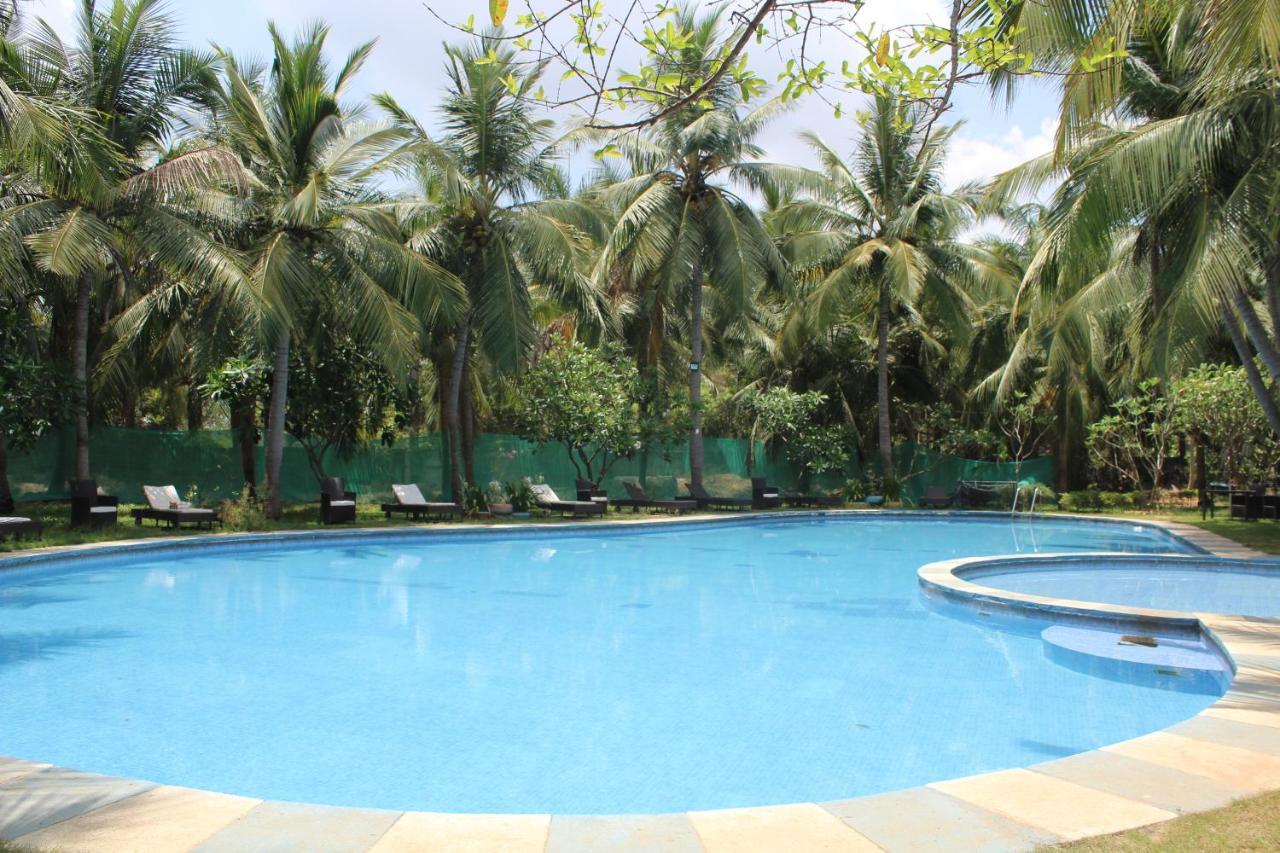 Citrus Hotel Sriperumbudur Bagian luar foto